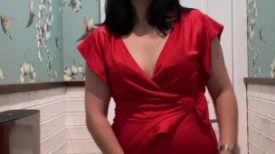 Hot brunette in red dress masturbates in a public restaurant